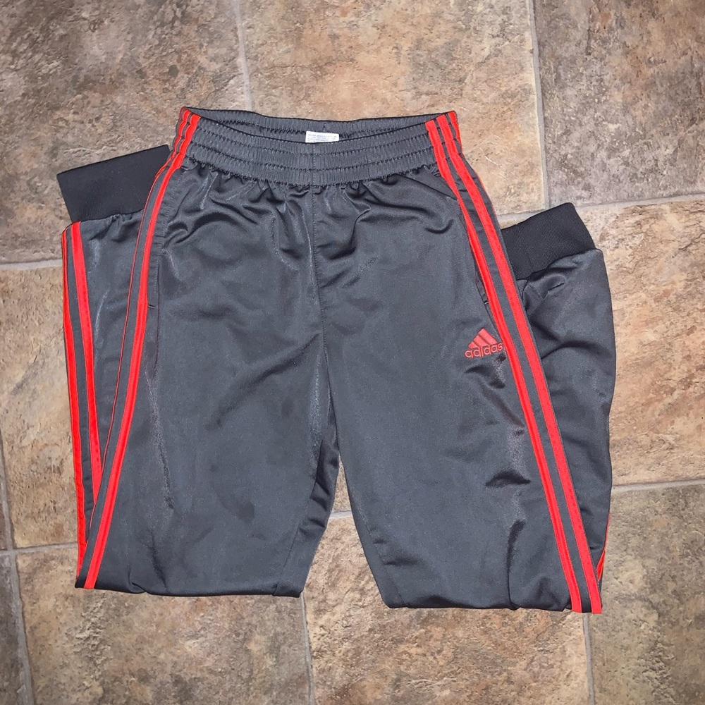 Gray Adidas sweats with orange stripes